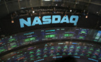 Nasdaq jumps to a record high