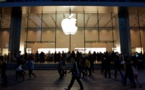 Apple to slow down new hires