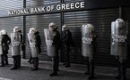 Greek Markets Plunge Amidst Hushed Talks for Debt Bailout